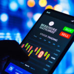 June 8, 2022, Brazil. In this photo illustration the stock trading graph of Berkshire Hathaway seen on a smartphone screen.